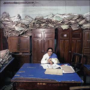 An archivist working in our Bangladesh office An archivist working in our Bangladesh office